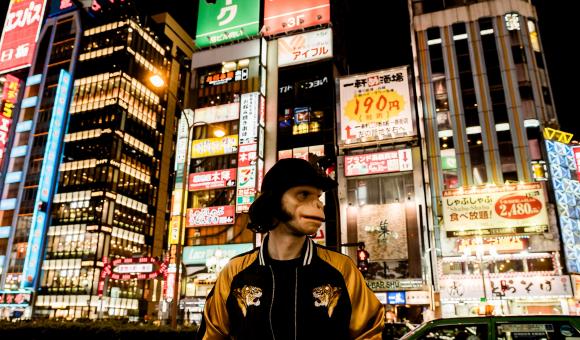 DJ Kid Noize performs in an ape mask